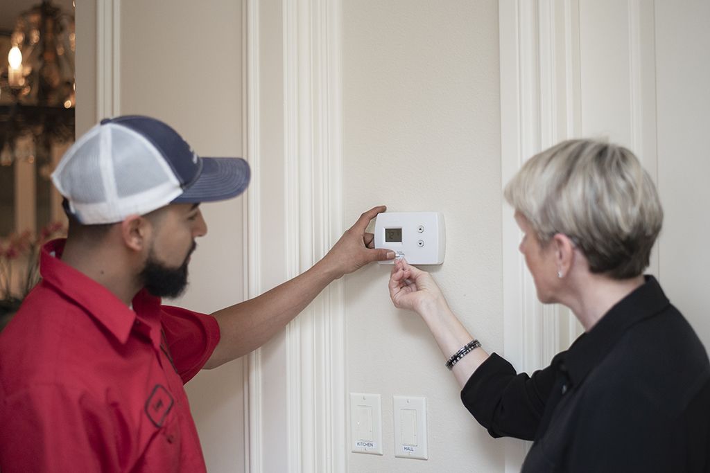 Aladdin cleaning specialist performs final walk-through of home to answer questions after professsional air duct cleaning
