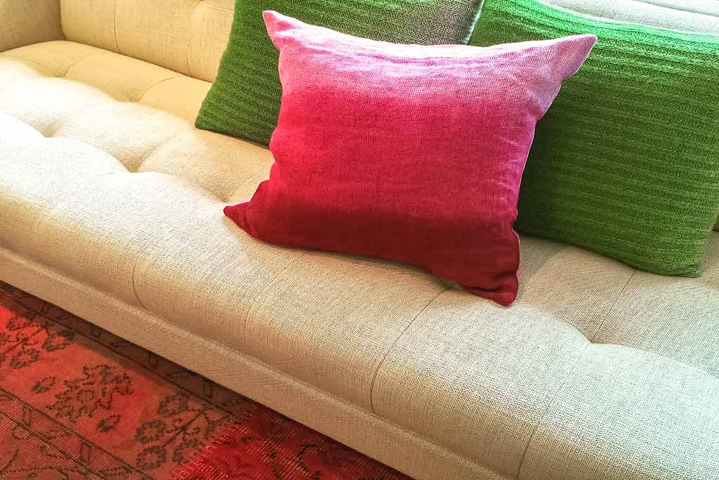 Professionally-applied fabric protection placed on textiles to protect from sun fading and more