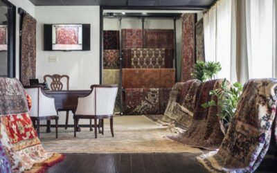 Several Oriental and antique rugs displayed inside Aladdin’s San Antonio Rug Gallery